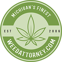 Weed Attorney Logo - Marijuana leaf inside green circle with white serif type